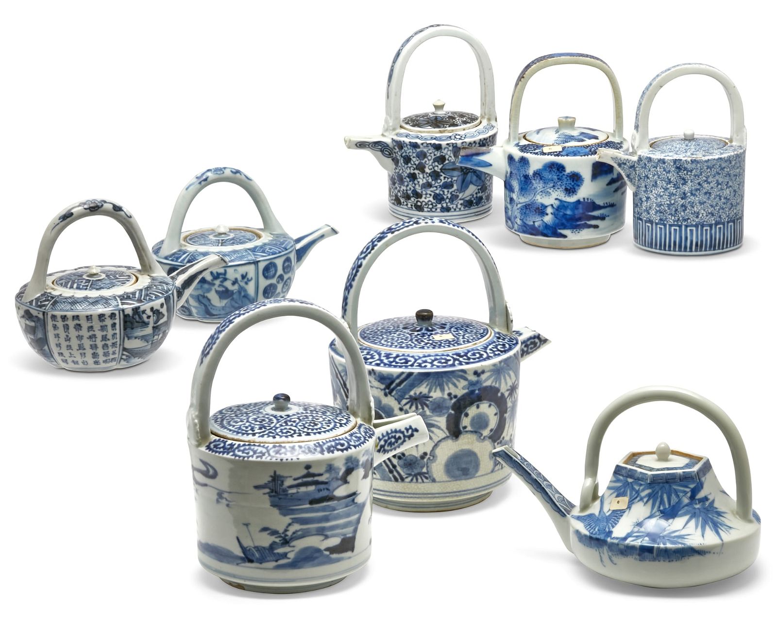 EIGHT JAPANESE BLUE AND WHITE PORCELAIN