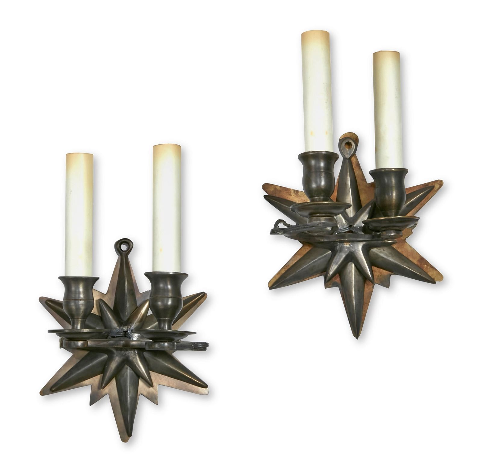 A PAIR OF SILVERED BRASS STAR FORM WALL