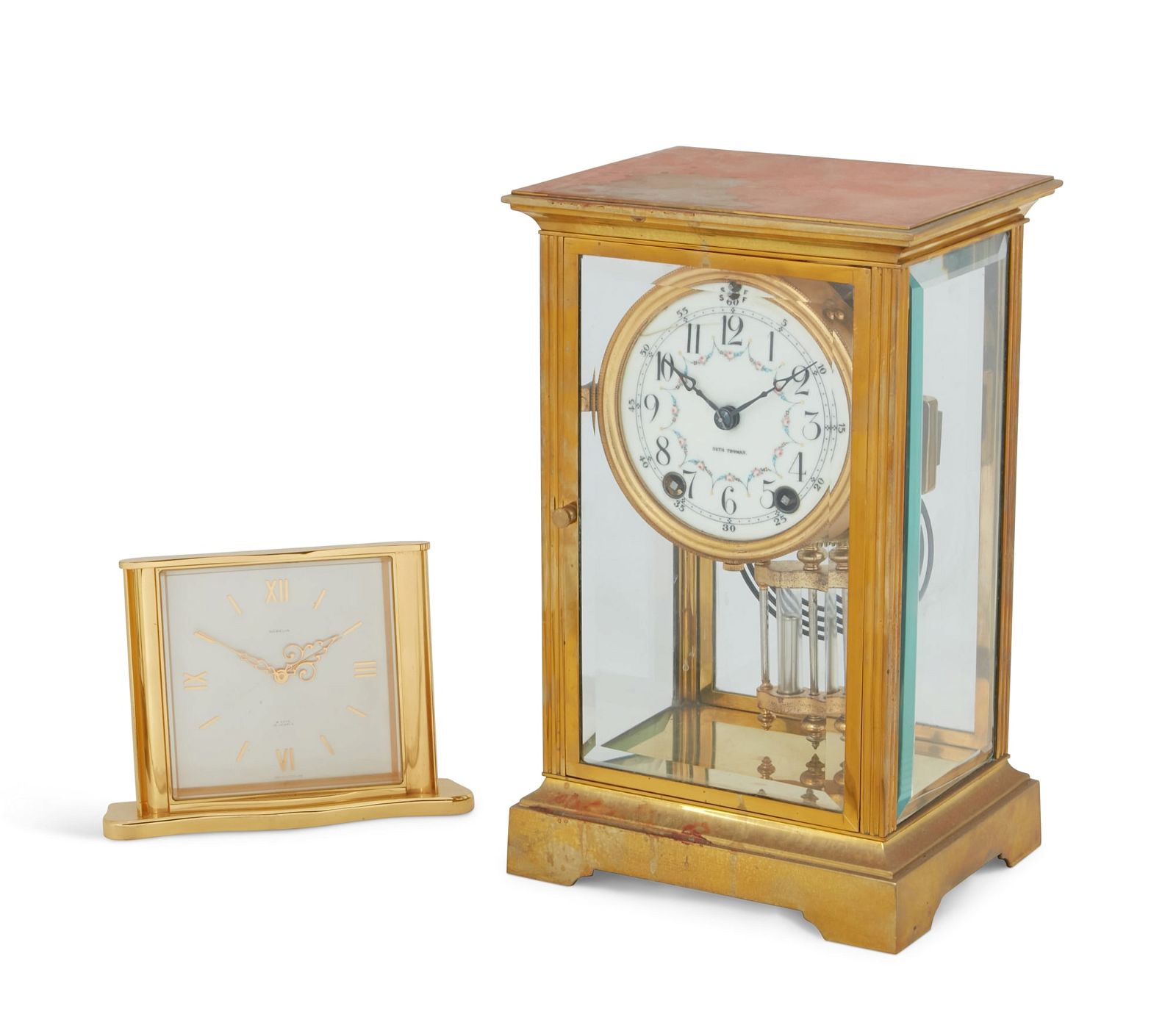 A FRENCH BRASS FOUR GLASS MANTEL CLOCKA