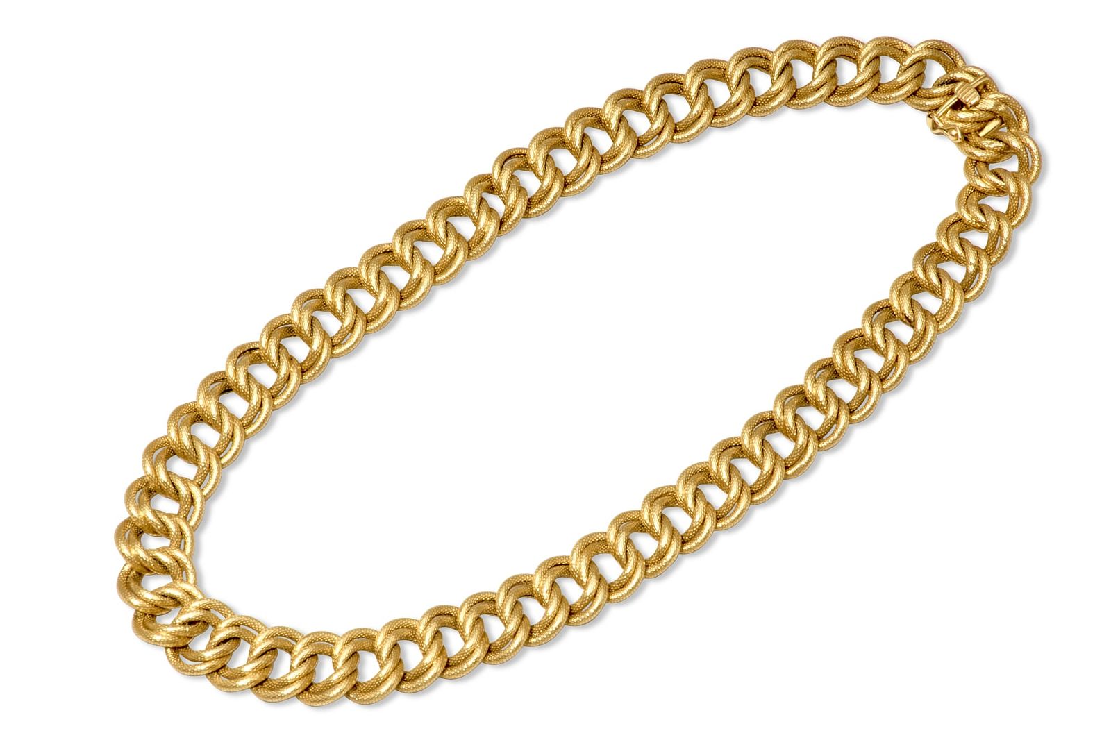 AN 18K YELLOW GOLD DOUBLE CURB 2fb3c88