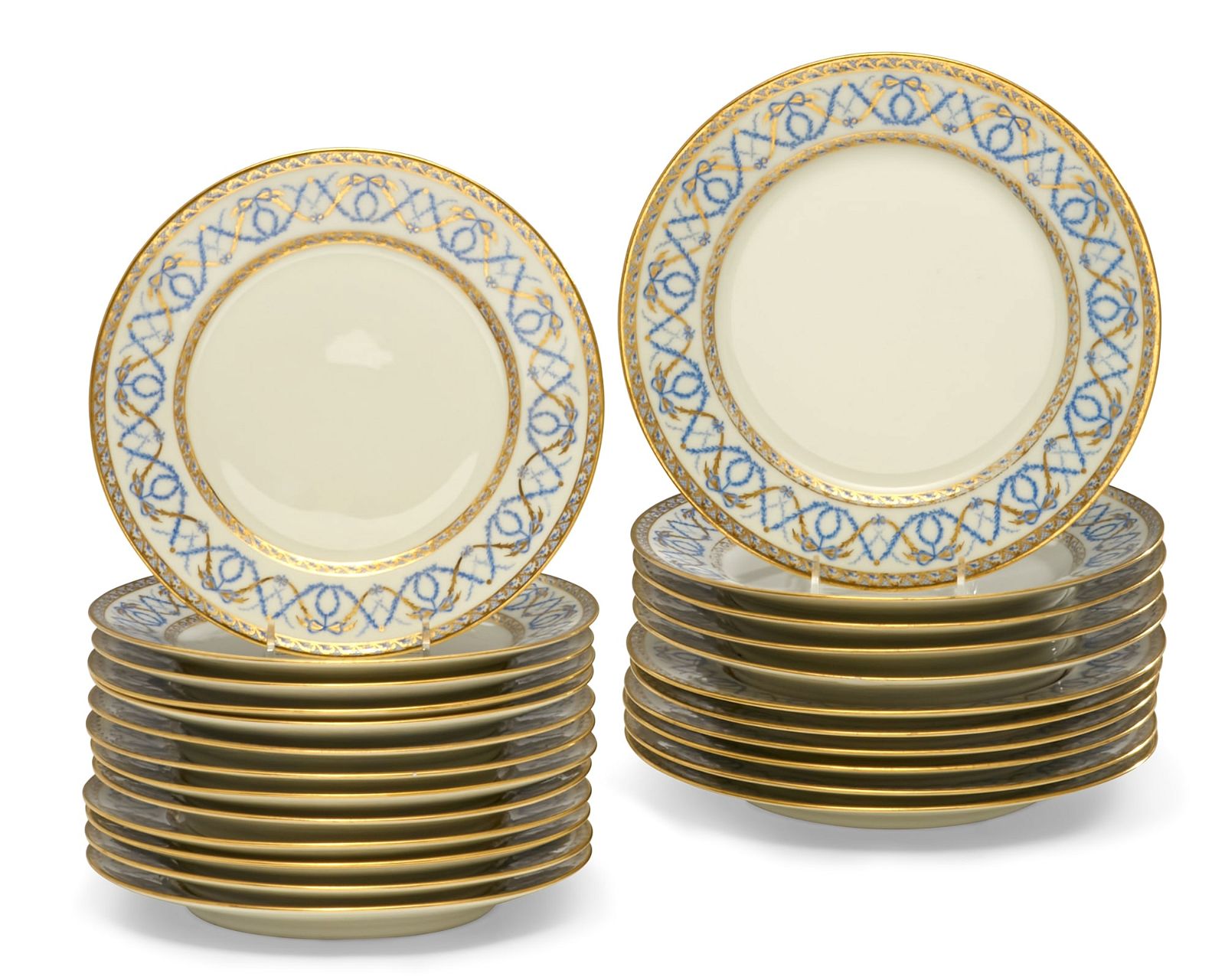 A SUITE OF TWENTY-FOUR LIMOGES PORCELAIN