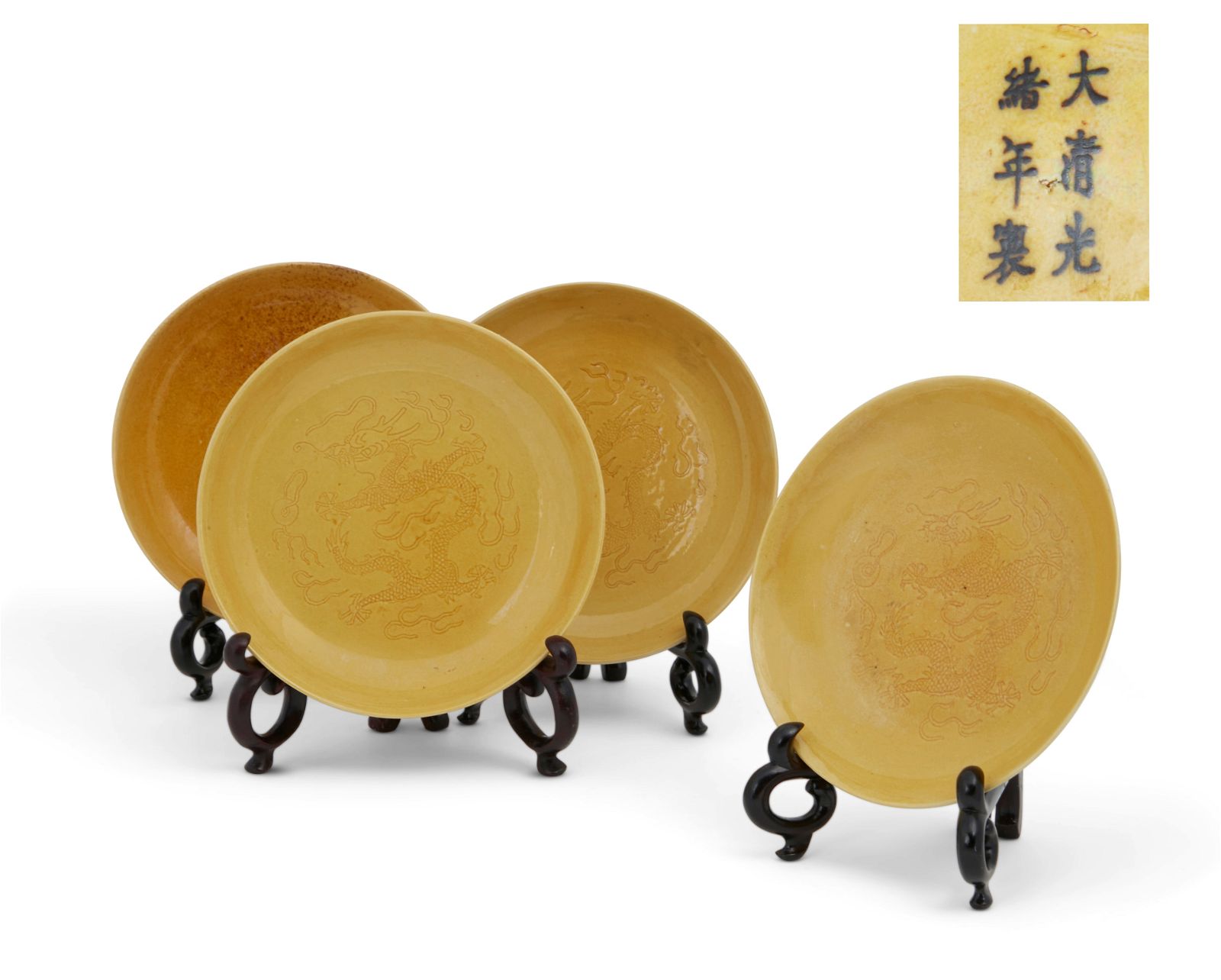 A SET OF FOUR CHINESE YELLOW GLAZED