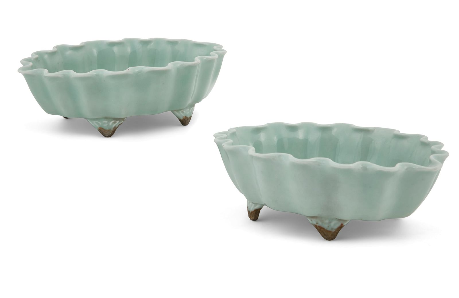 A PAIR OF CHINESE CELADON GLAZED OVAL