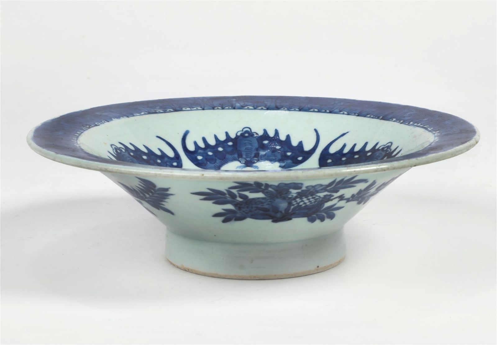 A CHINESE BLUE AND WHITE PORCELAIN FOOTED