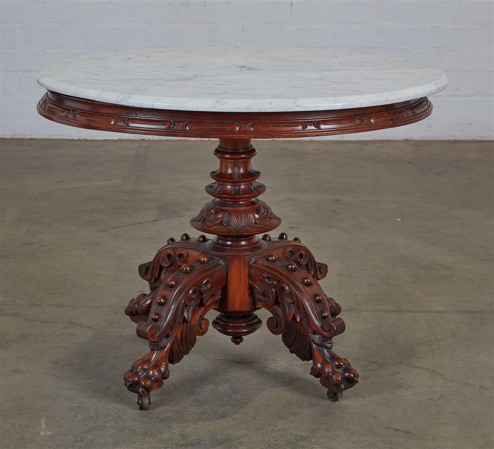 A RENAISSANCE STYLE OAK CENTER TABLEA