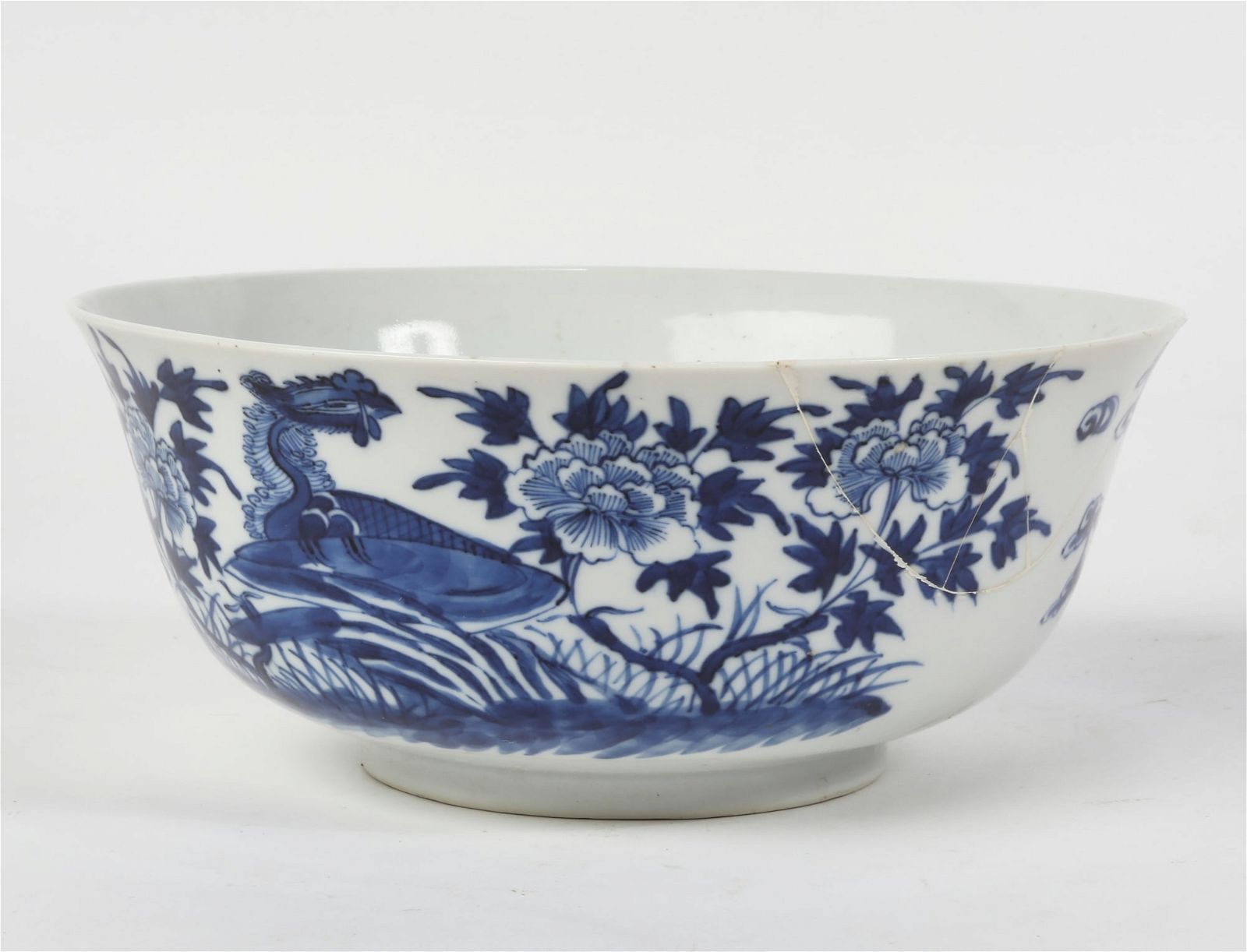 A CHINESE BLUE AND WHITE PORCELAIN PHOENIX