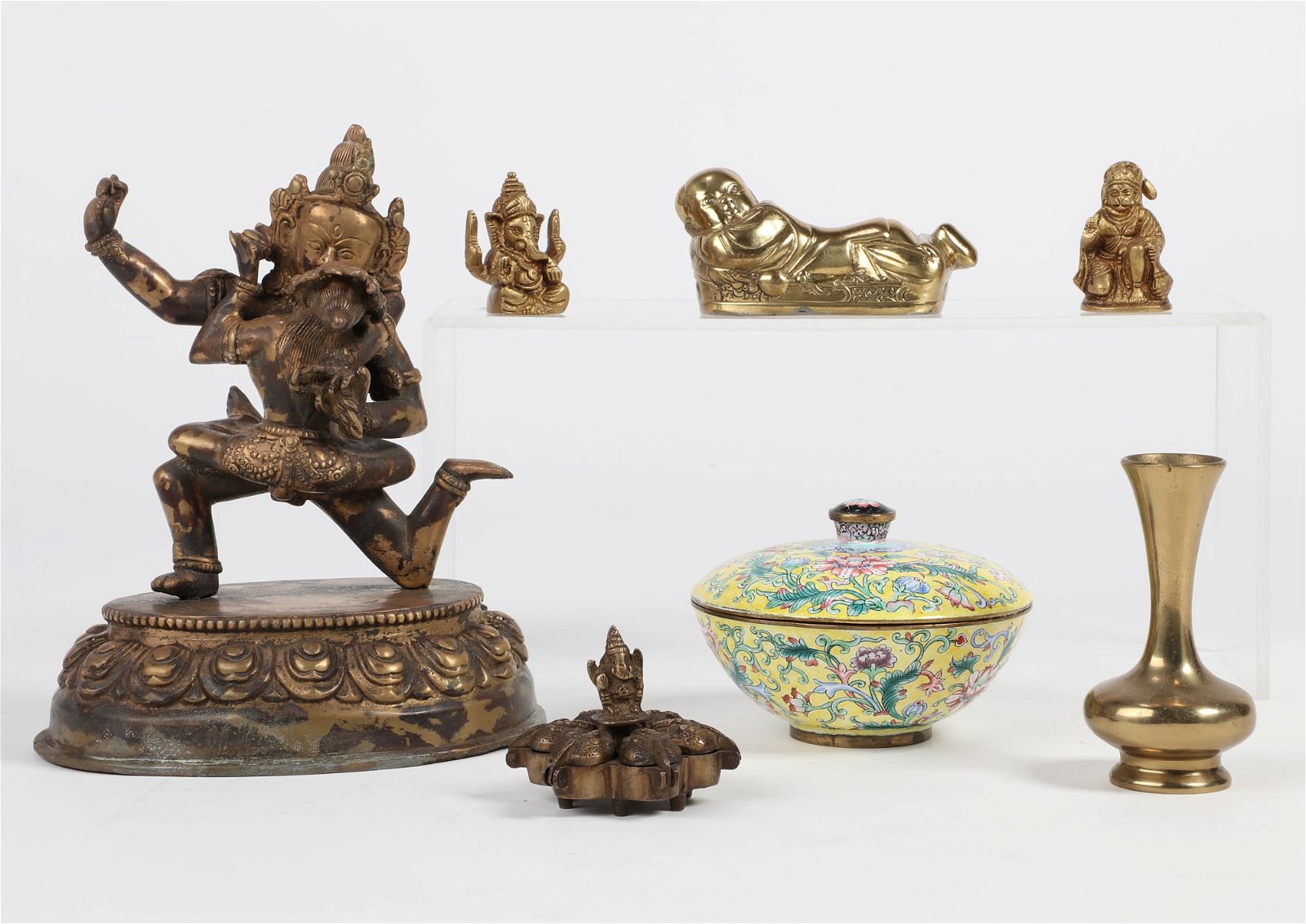 A GROUP OF SEVEN ASIAN BRONZES AND ENAMEL