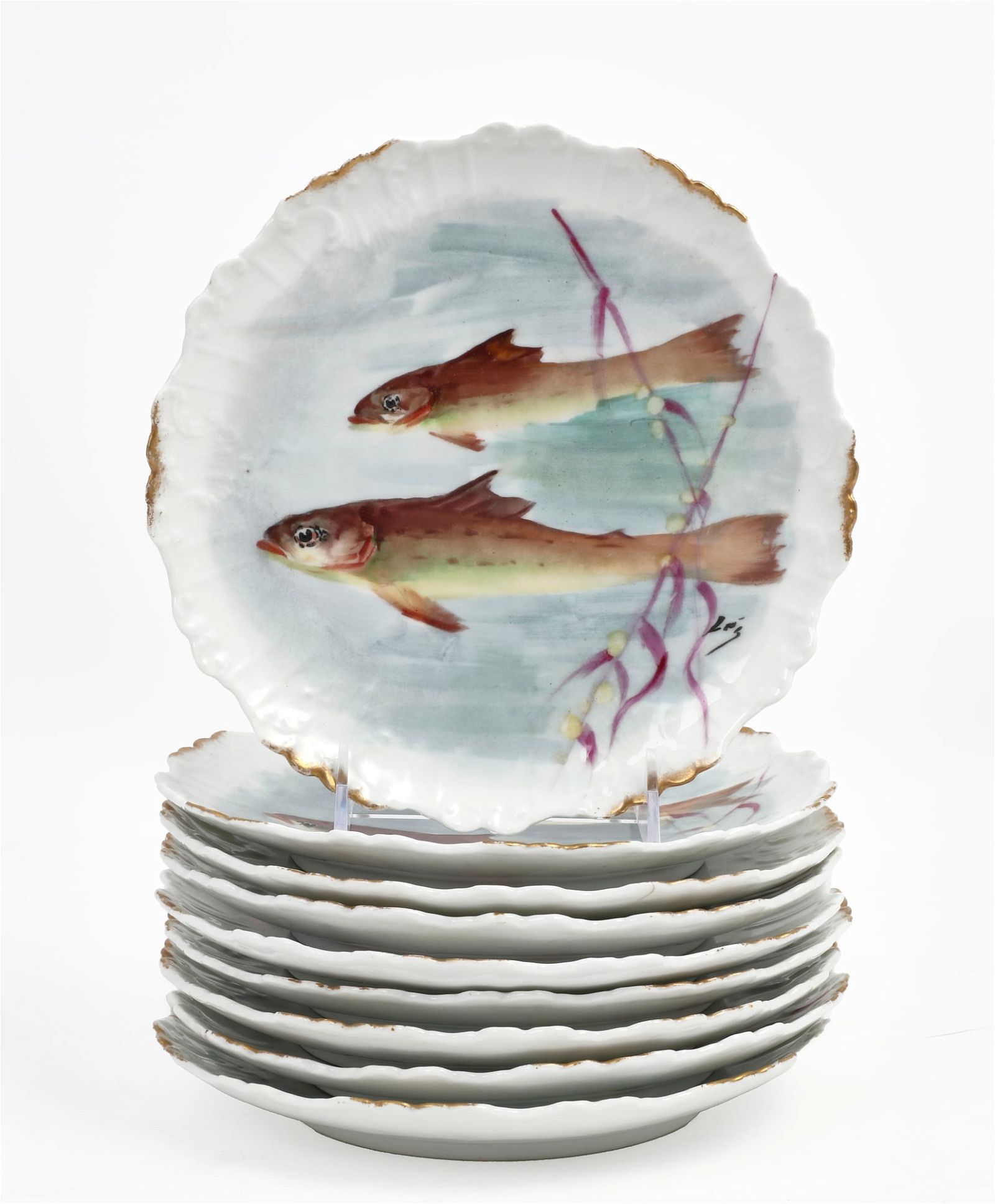 A SET OF NINE LIMOGES PORCELAIN FISH