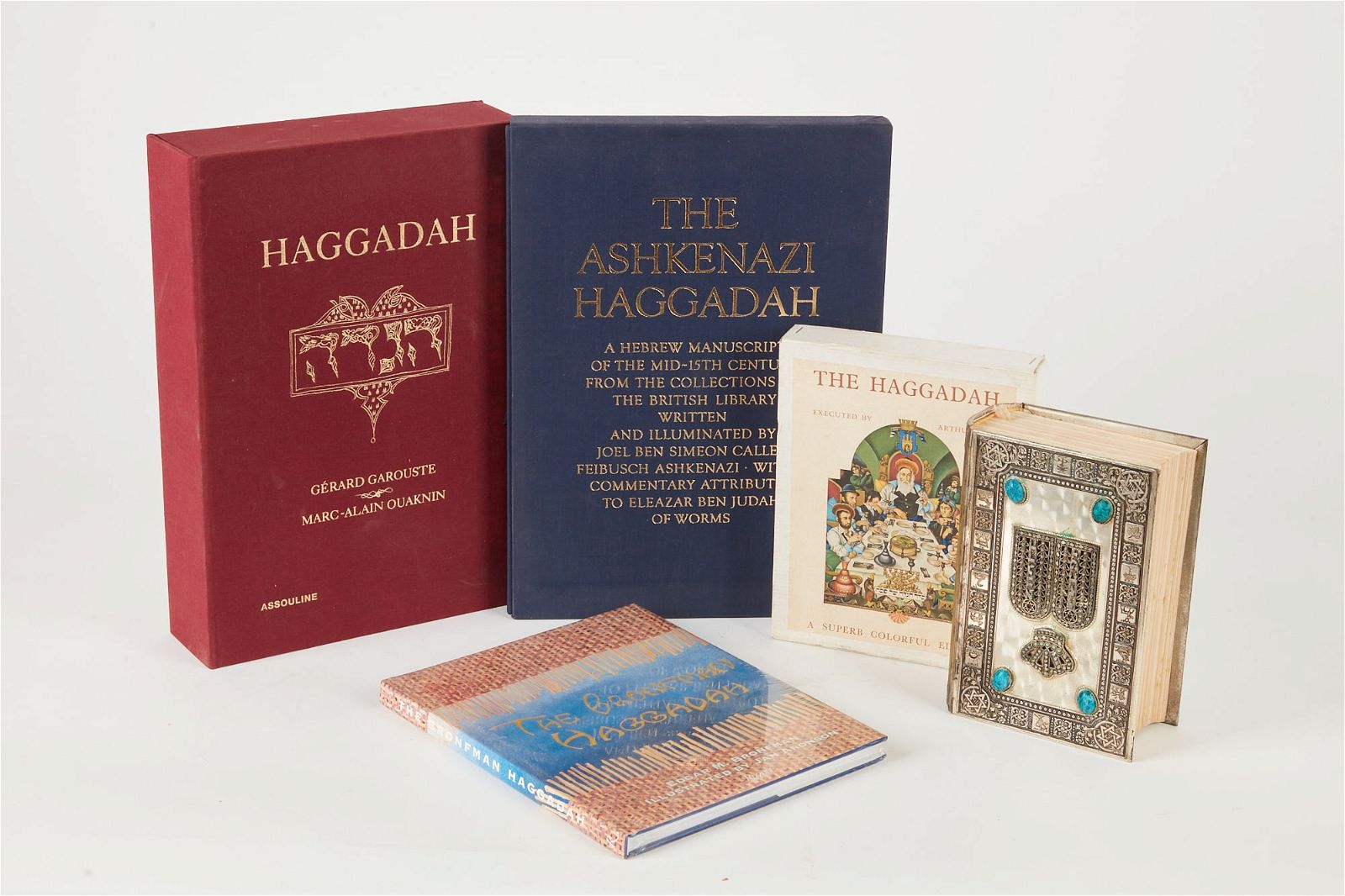 FOUR VARIOUS EDITIONS OF THE HAGGADAHFour