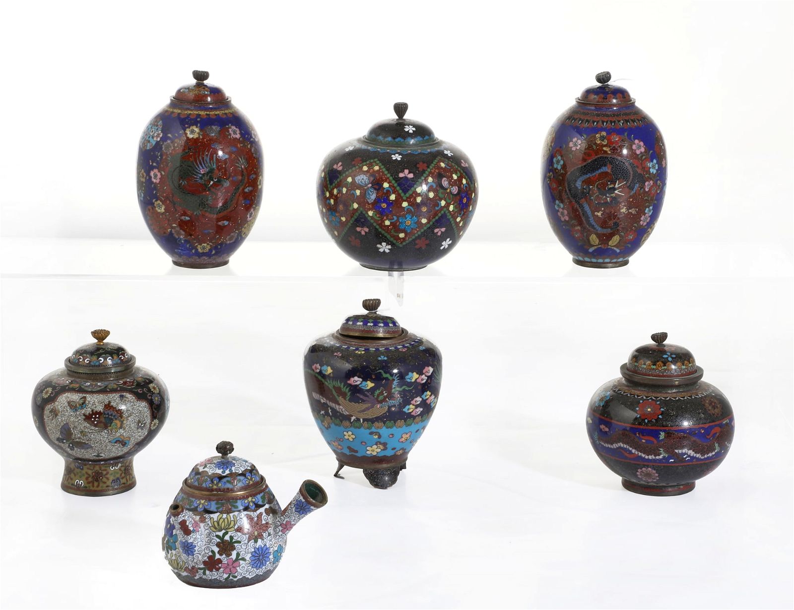 A GROUP OF SEVEN ASIAN CLOISONNE ARTICLESA