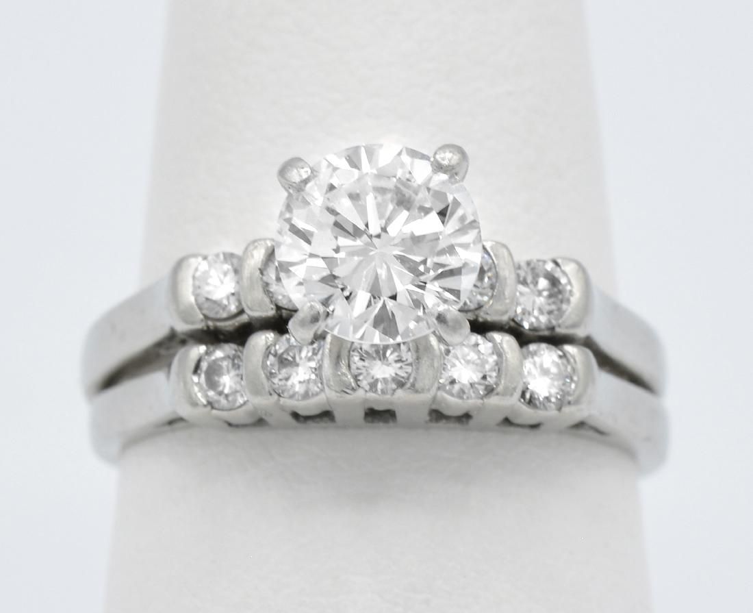 TWO PLATINUM DIAMOND RINGS, CENTER