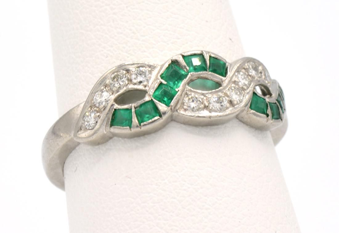 PLATINUM, DIAMOND & EMERALD RINGPlatinum,