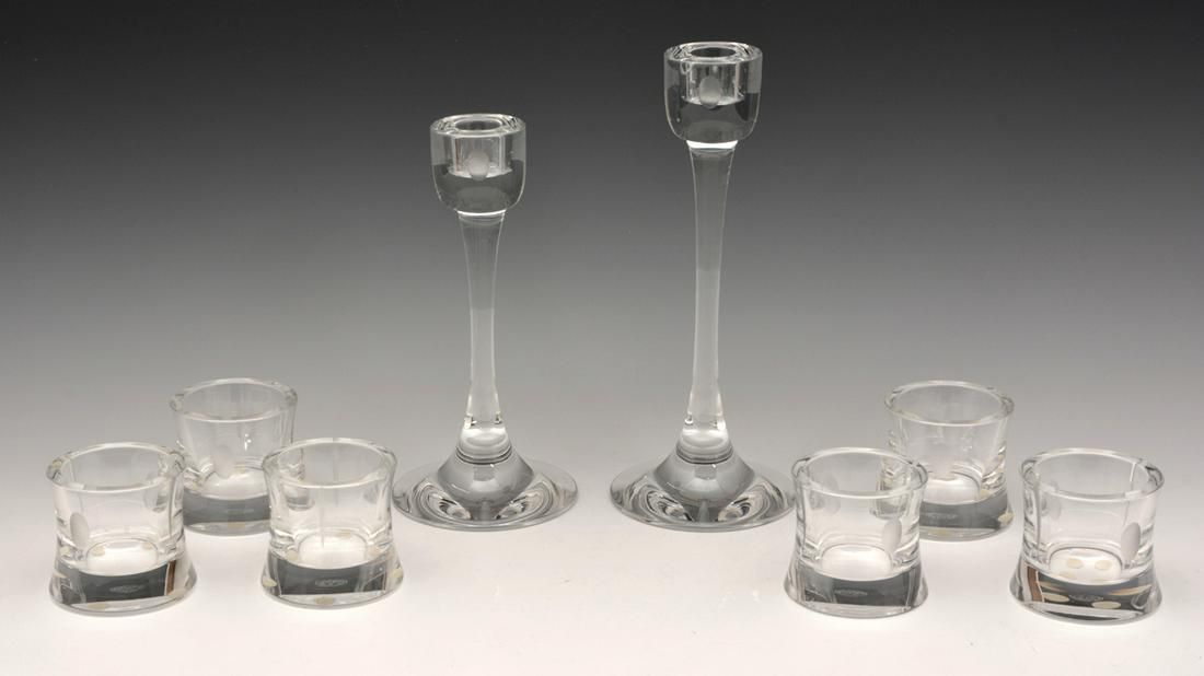 BACCARAT VOTIVES (6) AND CANDLESTICKS