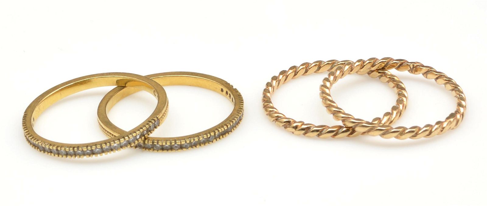 TWO PAIR OF GOLD STACKING RINGS 3d1e94
