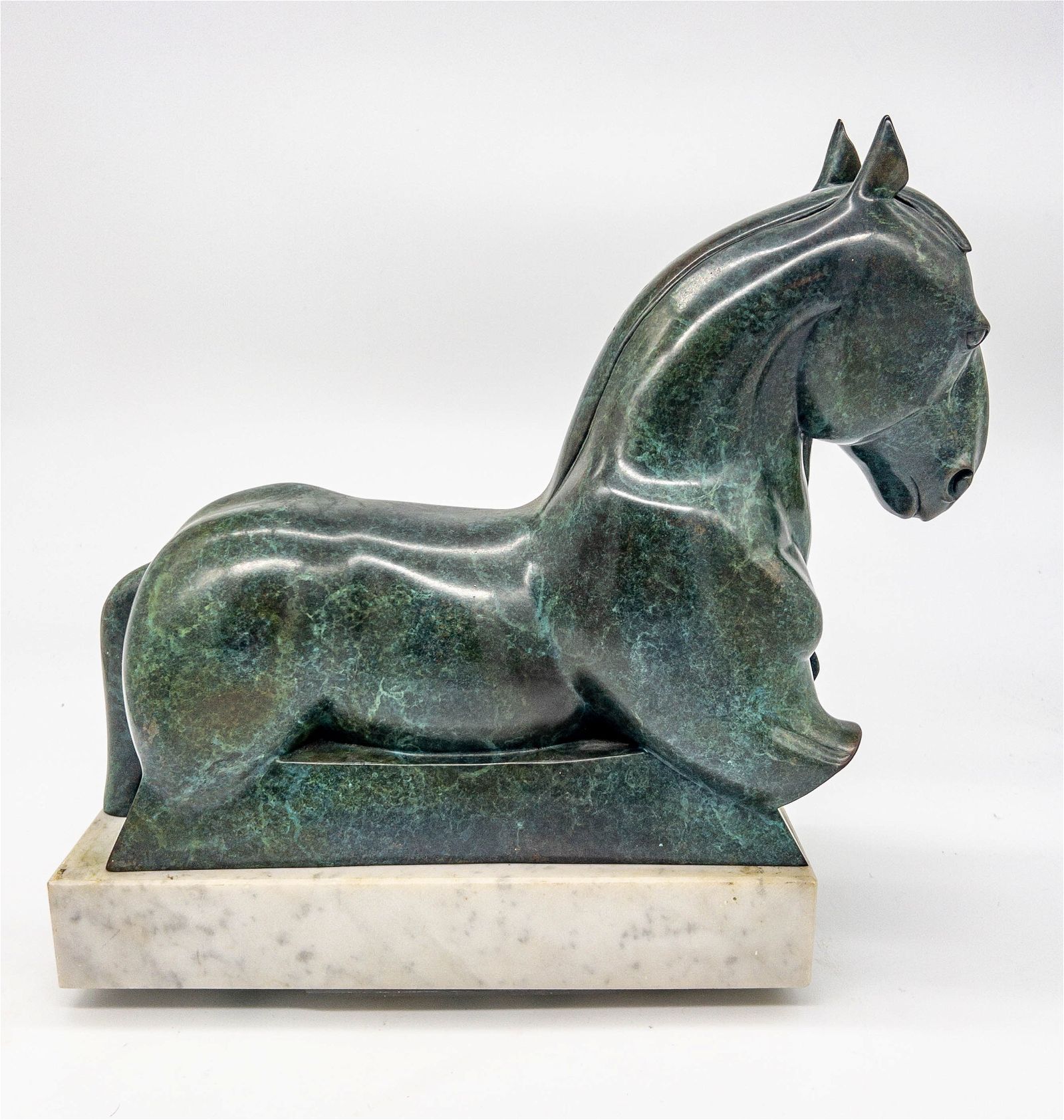 BRONZE RECUMBENT HORSE ON MARBLE