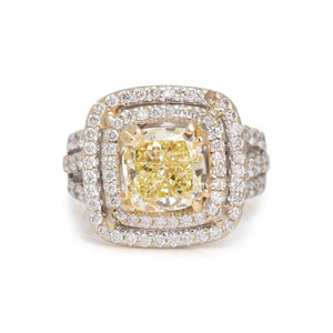 FANCY YELLOW DIAMOND AND DIAMOND RING
Cushion