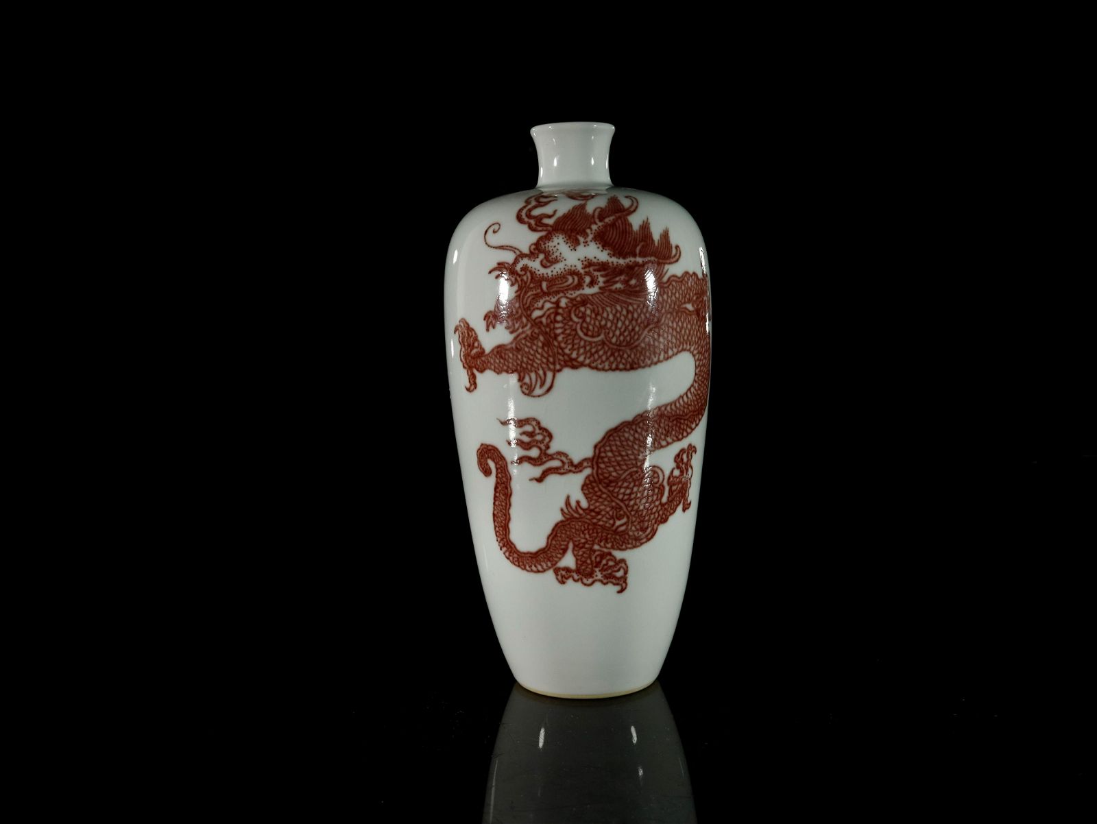 A FINE UNDERGLAZED RED DRAGON PATTERN 3d0c0a