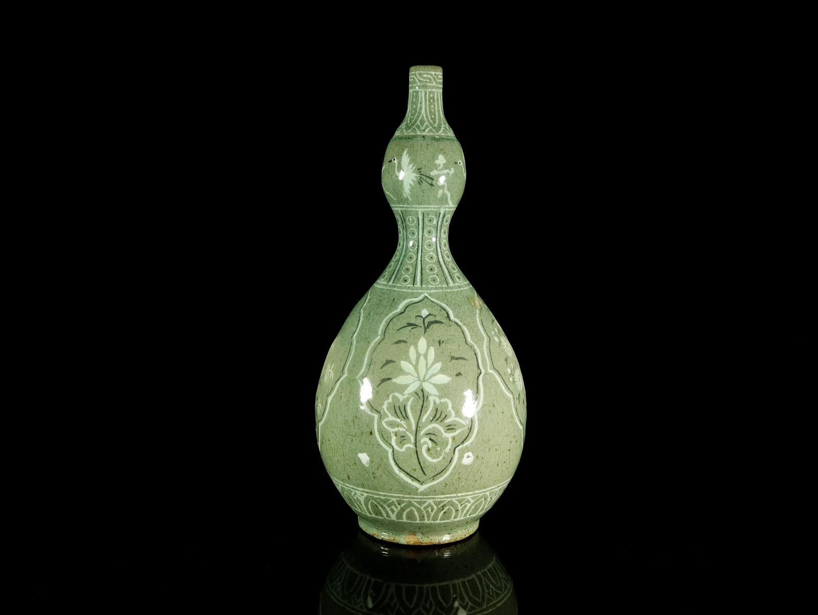 A KOREAN CELADON-GLAZED DOUBLE-GOURD