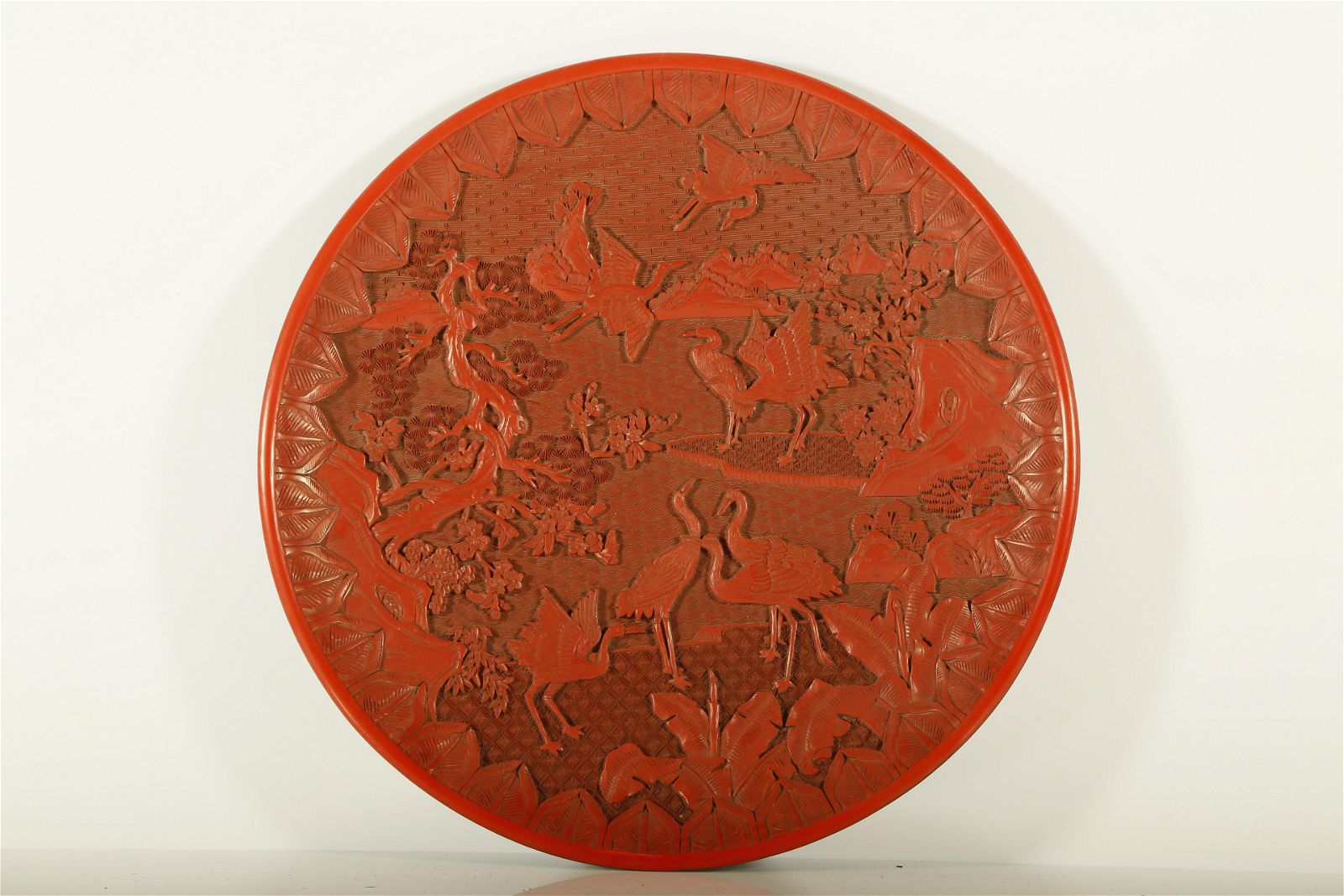 A MAGNIFICENT RED CARVED LACQUER 3d0e0d