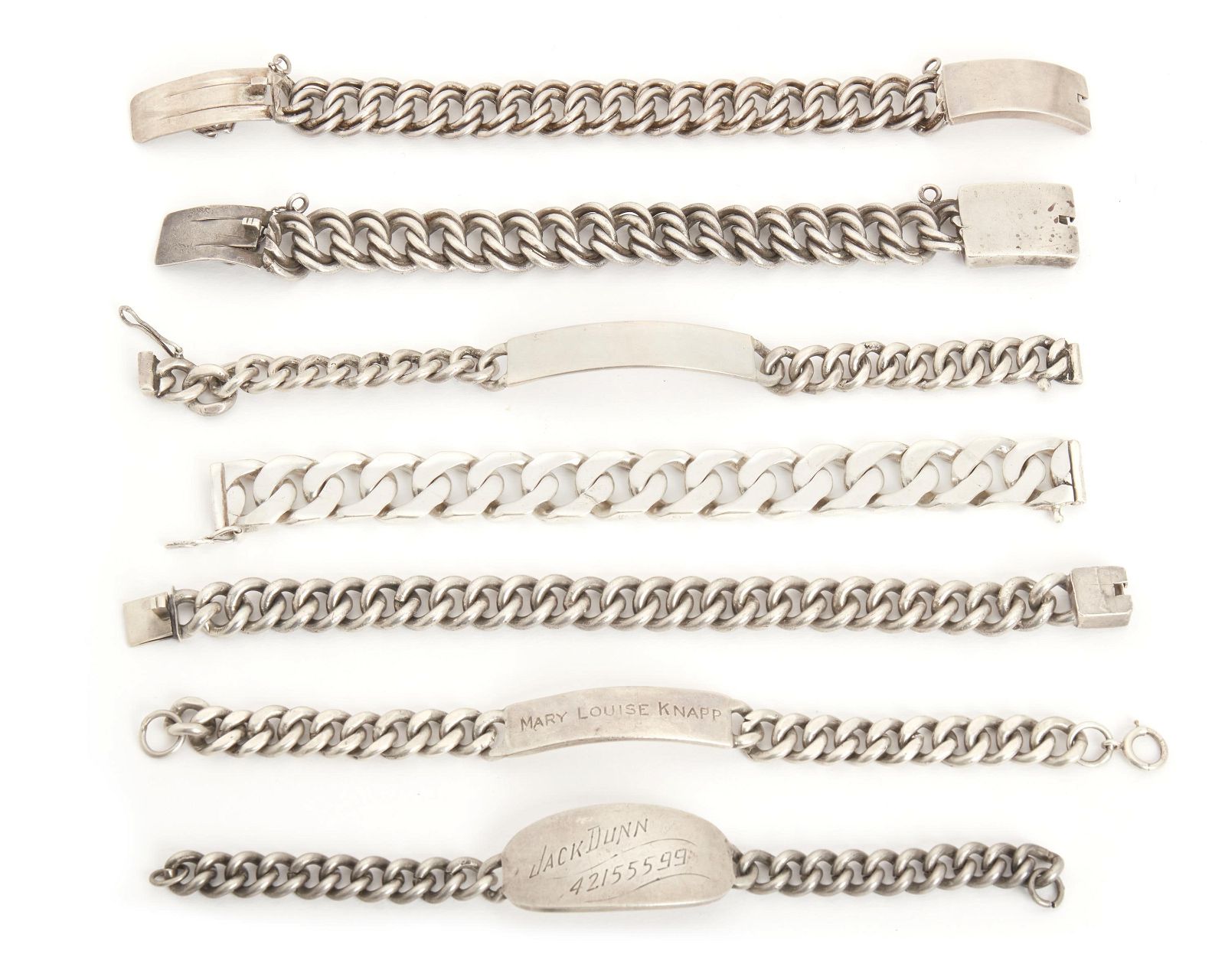 SEVEN SILVER AND METAL ID BRACELETSA