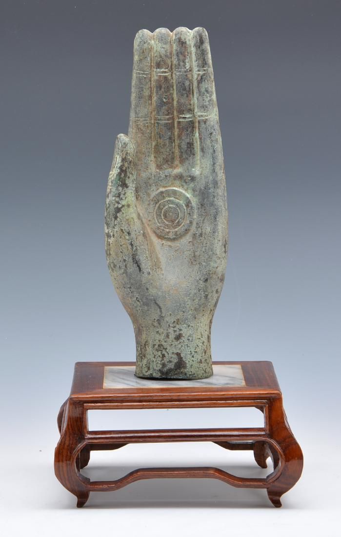 BRONZE BUDDHA HAND ON ASSOCIATED