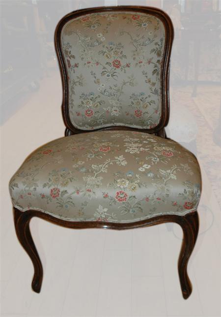 Set of Four Louis XV Style Walnut Chairs
	Estimate: $400  - $600