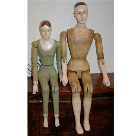Two Painted and Carved Wood Dolls  68729