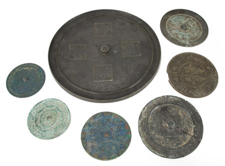 Group of Seven Chinese Bronze Mirrors
	