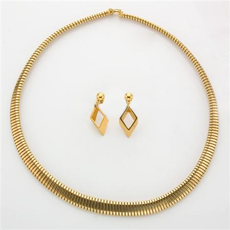 Gold Necklace and Pair of Metal Earrings
	
