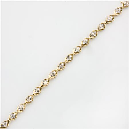 Gold and Diamond Bracelet
	  Estimate:$800-$1,200