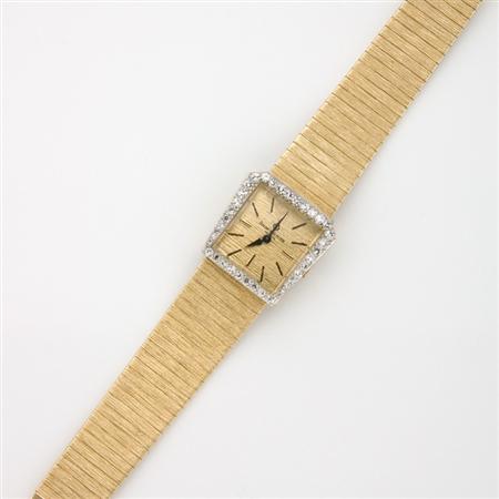 Gold and Diamond Wristwatch Baume 68bac