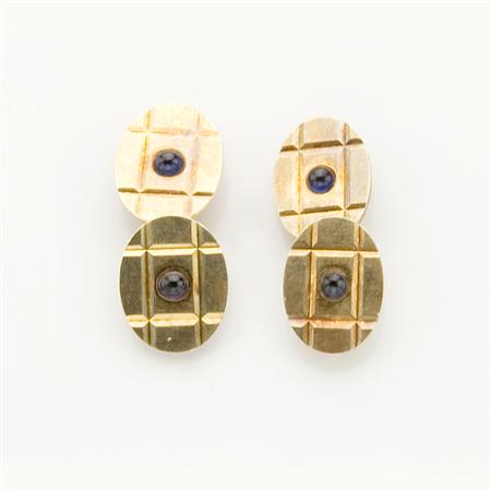 Pair of Gold and Cabochon Sapphire