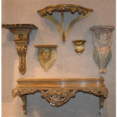 Group of Six Carved Wood Wall Brackets
	