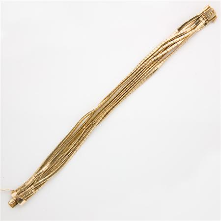 Seven Strand Gold Bracelet
	  Estimate:$500-$700