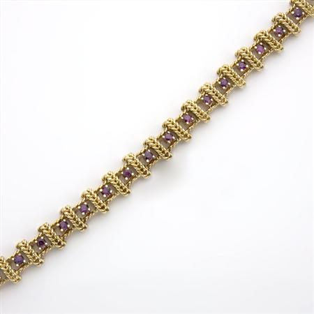 Gold and Garnet Bracelet
	  Estimate:$300-$400