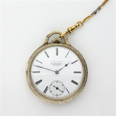 Open Face Pocket Watch with a Gold Chain,