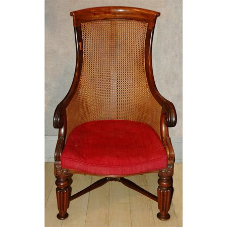 Victorian Mahogany and Caned Armchair
	