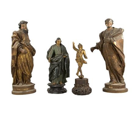 Group of Four Polychrome Wood Figures
	
