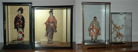 Group of Four Asian Dolls in Vitrines  69ae3