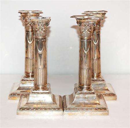 Set of Four English Silver Candlesticks  69b5b