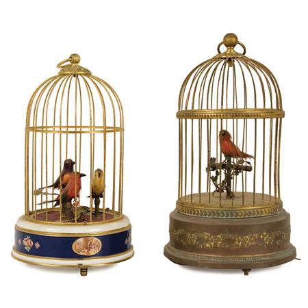 Two Gilt-Metal Singing Birdcages
	Estimate:&nbsp;$150&nbsp;&nbsp;-&nbsp;$250