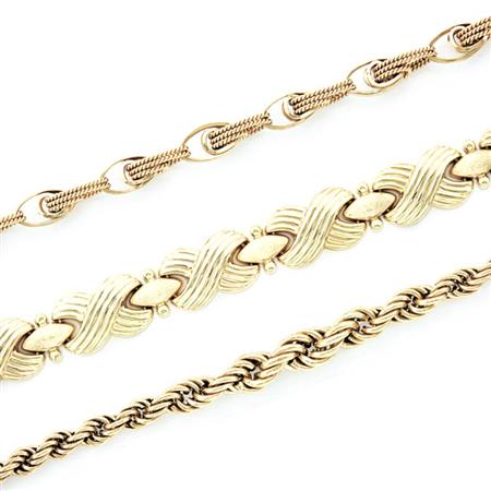 Three Gold Bracelets
	  Estimate:$600-$900