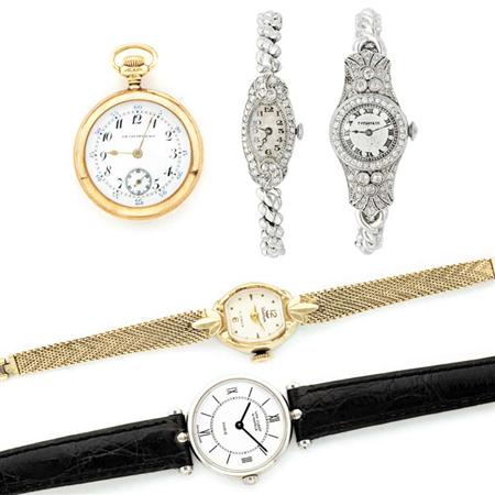Four Wristwatches and Gold Pendant-Watch
	
