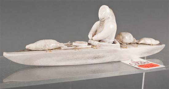 Inuit carved bone figural group