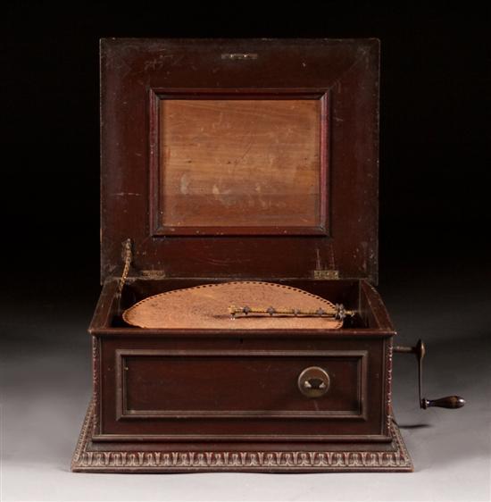 Regina mahogany coin-operated disc