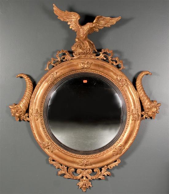 Regency style giltwood eagle convex