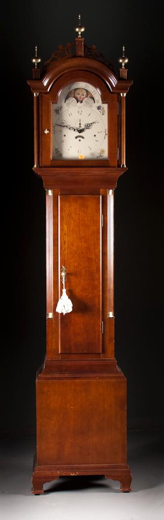 Chippendale style cherrywood tall