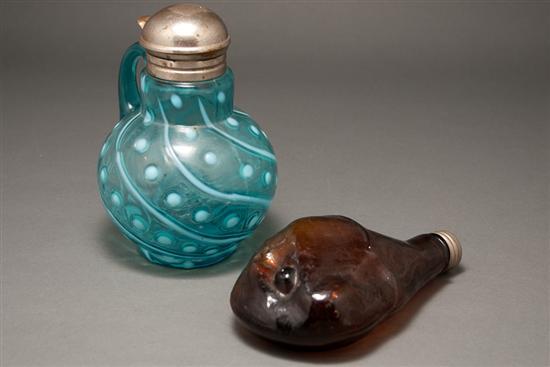 Metal-mounted blue glass syrup jug;