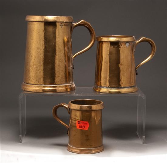 Three English brass graduated tankards  77b86