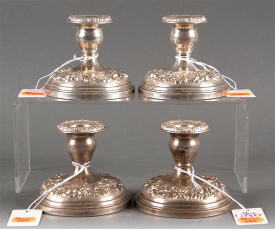 Four American repousse silver candleholders  77fa2